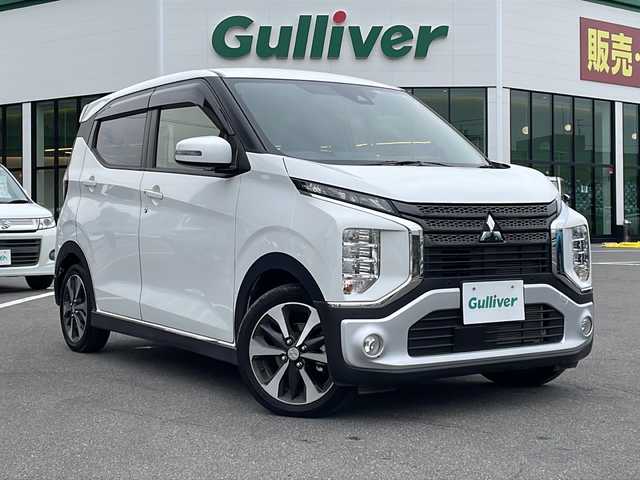 三菱 ｅＫクロス T 長野県 2022(令4)年 0.8万km シルキーホワイト 禁煙車/社外9インチナビ/【MDV-M908HDL】/(CD/DVD/フルセグTV/BluetoothAudio)/e-Assist/・衝突被害軽減ブレーキ/・車線逸脱警報システム/・オートマチックハイビーム/・前方衝突予測警報/・ふらつき警報/・先行車発進告知機能/・標識認識システム/バックカメラ/前後ドライブレコーダー機能付デジタルインナーミラー/前席シートヒーター/ベンチシート/革巻きステアリング/ステアリングスイッチ/LEDヘッドライト/フォグランプ/オートライト/スマートキー/Pスタート/電動格納ミラー/純正15インチAW