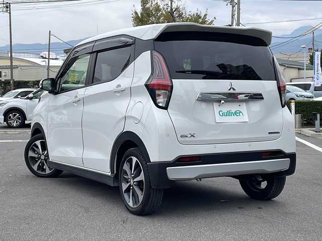 三菱 ｅＫクロス T 長野県 2022(令4)年 0.8万km シルキーホワイト 禁煙車/社外9インチナビ/【MDV-M908HDL】/(CD/DVD/フルセグTV/BluetoothAudio)/e-Assist/・衝突被害軽減ブレーキ/・車線逸脱警報システム/・オートマチックハイビーム/・前方衝突予測警報/・ふらつき警報/・先行車発進告知機能/・標識認識システム/バックカメラ/前後ドライブレコーダー機能付デジタルインナーミラー/前席シートヒーター/ベンチシート/革巻きステアリング/ステアリングスイッチ/LEDヘッドライト/フォグランプ/オートライト/スマートキー/Pスタート/電動格納ミラー/純正15インチAW