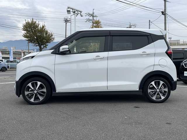 三菱 ｅＫクロス T 長野県 2022(令4)年 0.8万km シルキーホワイト 禁煙車/社外9インチナビ/【MDV-M908HDL】/(CD/DVD/フルセグTV/BluetoothAudio)/e-Assist/・衝突被害軽減ブレーキ/・車線逸脱警報システム/・オートマチックハイビーム/・前方衝突予測警報/・ふらつき警報/・先行車発進告知機能/・標識認識システム/バックカメラ/前後ドライブレコーダー機能付デジタルインナーミラー/前席シートヒーター/ベンチシート/革巻きステアリング/ステアリングスイッチ/LEDヘッドライト/フォグランプ/オートライト/スマートキー/Pスタート/電動格納ミラー/純正15インチAW