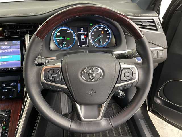 トヨタ ハリアー ハイブリッド プレミアム 道央・札幌 2014(平26)年 1.4万km ダークブラウンM ・4WD / エアロ（フロント/サイド/リア）/・純正9インチSDナビ/・CD/DVD/SD/Bluetooth接続/・バックカメラ/・トヨタセーフティセンス/・プリクラッシュセーフティ/・レーダークルーズコントロール/・・レザーシート/シートヒーター/・パワーシート/シートポジションメモリー/・レーンキープアシスト/・LEDオートライト/オートマチックハイビーム/・パワーバックドア/AC100V電源/・前方ドライブレコーダー/・ビルトインETC/MTモード付AT/・純正フロアマット/ドアバイザー/オートリトラミラー