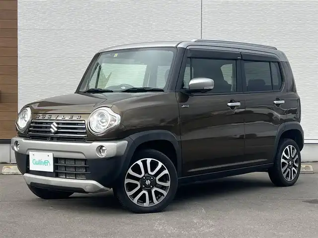 スズキ ハスラー Jスタイル Ⅲ 秋田県 2018(平30)年 4.7万km ブレイブカーキパール/スチールシルバー ４WD/衝突軽減システム/純正SDナビ（DVD/CD/BT）/フルセグ/全方位モニター/スズキ純正15インチアルミ（夏タイヤ装着）/スマートキー/アイドリングストップ/プッシュスタート/レーンキープアシスト/ダウンヒルアシストコントロール/ステアリングスイッチ/前席シートヒーター/ビルトインETC/ルーフレール/純正フロアマット/純正ドアバイザー/オートライト/オートエアコン/パワーステアリング/パワーウィンドウ/横滑り防止/盗難防止装置/寒冷地仕様/電動格納ウィンカーミラー/保証書/取扱説明書/記録簿/スペアキー×１