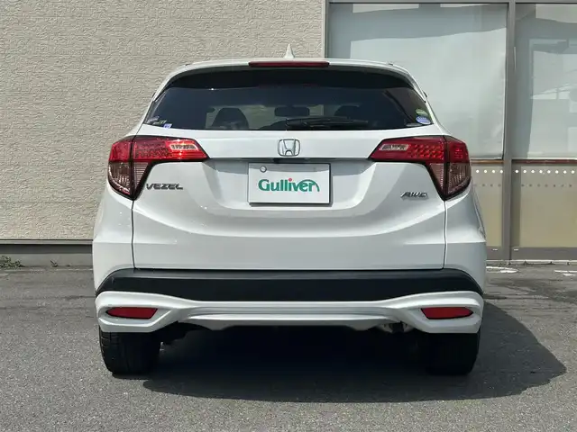 ホンダ ヴェゼル G 大阪府 2015(平27)年 0.5万km ホワイトオーキッドパール ・4WD/・寒冷地仕様/・純正ナビ/・バックカメラ/・フルセグ/・CD/BT/USB/・プッシュスタート/・スマートキー/・横滑り防止/・ワイパーデアイサー/・アイドリングストップ/・ETC/・ミラーヒーター/・電動格納ウィンカーミラー/・社外AW付夏タイヤ積込/・純正フロアマット/・ドアバイザー/・保証書・取説あり