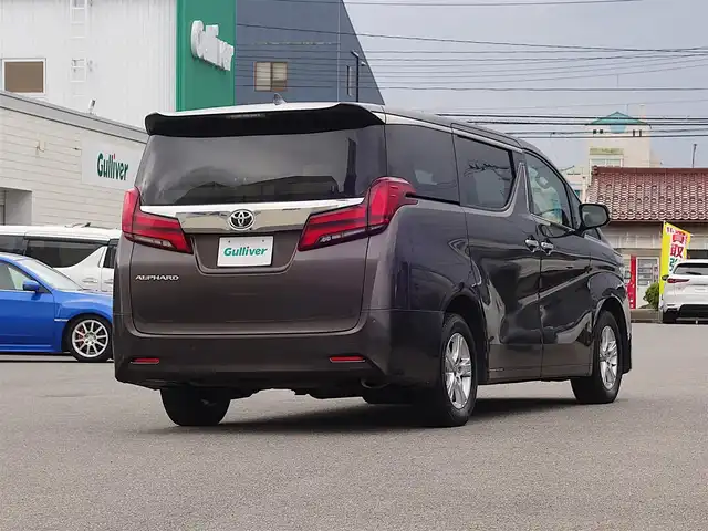 トヨタ アルファード X 山形県 2022(令4)年 6.8万km グラファイトM 4WD/衝突被害軽減システム/純正ディスプレイオーディオ/　　【BT USB Miracast AM/FM】/バックカメラ/両側パワースライドドア/レーダークルーズコントロール/LEDオートヘッドライト/純正16インチアルミホイール/アイドリングストップ/ステアリングスイッチ/MTモード付AT/電動格納ウィンカーミラー/フォグランプ/スマートキー/ETC