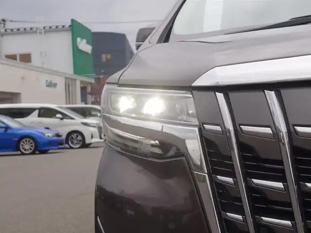 トヨタ アルファード X 山形県 2022(令4)年 6.8万km グラファイトM 4WD/衝突被害軽減システム/純正ディスプレイオーディオ/　　【BT USB Miracast AM/FM】/バックカメラ/両側パワースライドドア/レーダークルーズコントロール/LEDオートヘッドライト/純正16インチアルミホイール/アイドリングストップ/ステアリングスイッチ/MTモード付AT/電動格納ウィンカーミラー/フォグランプ/スマートキー/ETC