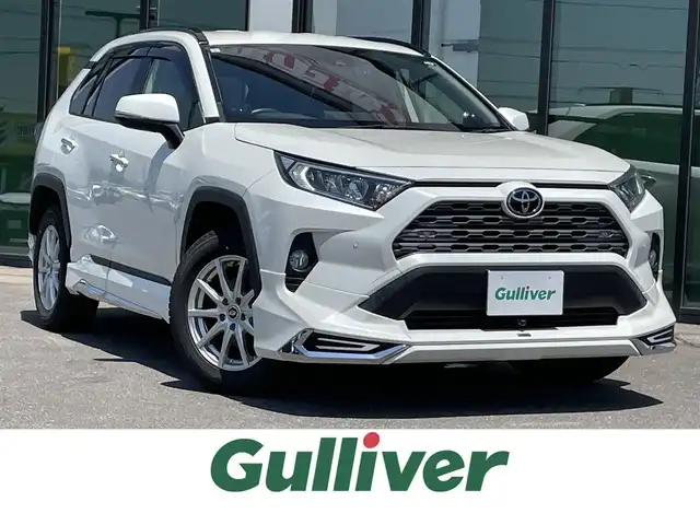 トヨタ ＲＡＶ４ G Zパッケージ 道南・函館 2019(令1)年 3.1万km ホワイトパールクリスタルシャイン ・寒冷地仕様/・Toyota Safety Sense//プリクラッシュセーフティ//レーダークルーズコントロール//オートハイビーム//ブラインドスポットモニター//コーナーセンサー/・モデリスタエアロ/・純正AWノーマルタイヤ積込/・純正9インチナビ/・フルセグTV/・バックカメラ/・ETC/・ドライブレコーダー前後/・電動リアゲート/・前席シートヒーター/・全席パワーシート/・レザーシート/・デジタルインナーミラー/・ワイパーデアイサー/・ステアリングヒーター/・電動パーキングブレーキ/・オートブレーキホールド/・スマートキー