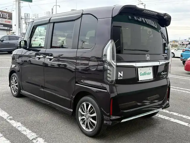 ホンダ Ｎ ＢＯＸ カスタム L 徳島県 2021(令3)年 2.7万km プレミアムベルベットパープル・パール 社外ナビゲーション　/（フルセグ/CD/DVD/SD/Bluetooth）/バックモニター　/社外ドライブレコーダー　/ホンダセンシング/・アダプティブ・クルーズ・コントロール（ACC）/・車線維持支援システム（LKAS）/・衝突軽減ブレーキ（CMBS）/・誤発進抑制機能（前進）/・歩行者事故低減ステアリング/・路外逸脱抑制機能/・先行車発進お知らせ機能/・標識認識機能/・オートハイビーム/・誤発進抑制機能（後進）/片側パワースライドドア　/トラクションコントロール　/ＬＥＤヘッドライト　/ＬＥＤフォグランプ　/ステアリングリモコン/ウィンカーミラー　/リヤワイパー/プッシュスタート　/スマートキー/カーテンエアバック/純正フロアマット