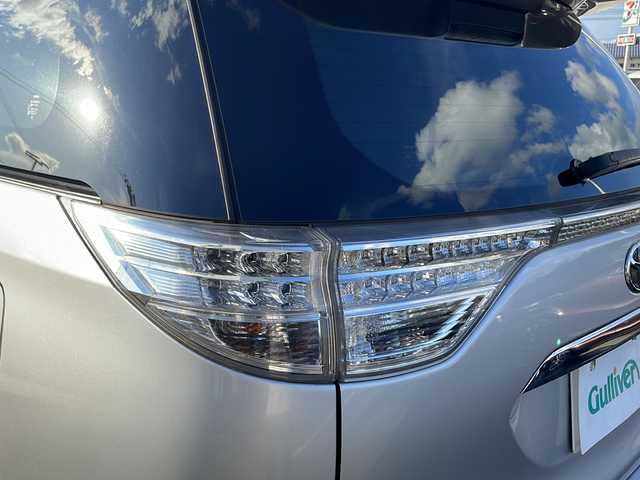 トヨタ エスティマ アエラス プレミアムエディション 新潟県 2013(平25)年 8万km シルバーM 9インチSDナビ/（DTV/DVD/Bluetooth）/11.2インチフリップダウン/バックカメラ/ビルドインETC/クルーズコントロール/ドラレコ/黒ハーフレザー/オットマン/両側パワースライドドア/HIDヘッドライト/フォグランプ/ウィンカーミラー/電格ミラー/ドアバイザー/モデリスタエアロ/ウェッズアルミホイール/社外マフラー