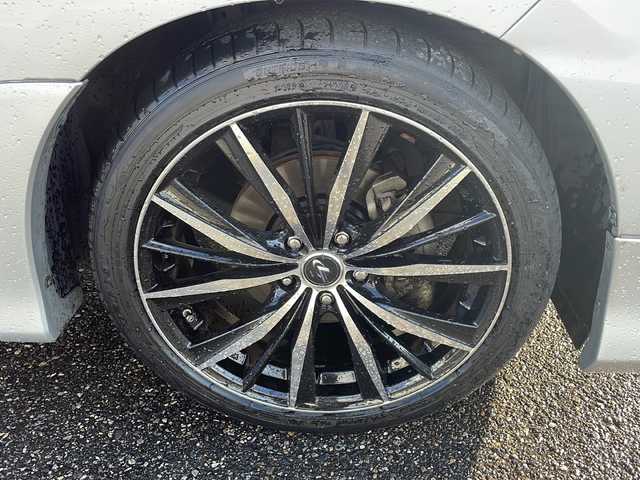 トヨタ エスティマ アエラス プレミアムエディション 新潟県 2013(平25)年 8万km シルバーM 9インチSDナビ/（DTV/DVD/Bluetooth）/11.2インチフリップダウン/バックカメラ/ビルドインETC/クルーズコントロール/ドラレコ/黒ハーフレザー/オットマン/両側パワースライドドア/HIDヘッドライト/フォグランプ/ウィンカーミラー/電格ミラー/ドアバイザー/モデリスタエアロ/ウェッズアルミホイール/社外マフラー