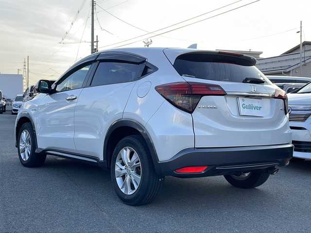ホンダ ヴェゼル ハイブリッド X ホンダセンシング 山形県 2019(平31)年 4.6万km プラチナホワイトパール Honda SENSING/・衝突軽減ブレーキ（ＣＭＢＳ）/・路外逸脱抑制機能/・先行車発進お知らせ機能/・アダプティブクルーズコントロール（ＡＣＣ）/・車線維持支援システム（ＬＫＡＳ）/・標識認識機能/・誤発進抑制機能 /パドルシフト/純正ナビ/CD.DVD.BT.USB.SD/バックカメラ/フルセグ/ETC/電動パーキングブレーキ/オートホールド/純正エンジンスターター/プッシュスタート/スマートキーｘ２/ＬＥＤヘッドライト