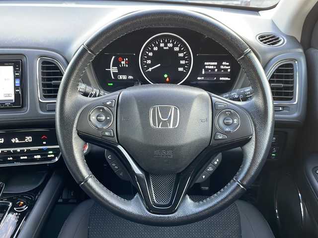 ホンダ ヴェゼル ハイブリッド X ホンダセンシング 山形県 2019(平31)年 4.6万km プラチナホワイトパール Honda SENSING/・衝突軽減ブレーキ（ＣＭＢＳ）/・路外逸脱抑制機能/・先行車発進お知らせ機能/・アダプティブクルーズコントロール（ＡＣＣ）/・車線維持支援システム（ＬＫＡＳ）/・標識認識機能/・誤発進抑制機能 /パドルシフト/純正ナビ/CD.DVD.BT.USB.SD/バックカメラ/フルセグ/ETC/電動パーキングブレーキ/オートホールド/純正エンジンスターター/プッシュスタート/スマートキーｘ２/ＬＥＤヘッドライト