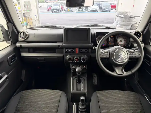 スズキ ジムニー ノマド FC 愛知県 2025(令7)年 0.1千km 黒 登録済み未使用車/４ＷＤ/スズキセーフティー/レーダークルーズコントロール/シートヒーター（D+N)/ミラーヒーター　/パーキングソナー/オートライト/純正１５インチＡＷ/革巻きステアリング/ダウンヒルアシストコントロール/LEDヘッドライト/スマートキー/Pスタート/横滑り防止装置
