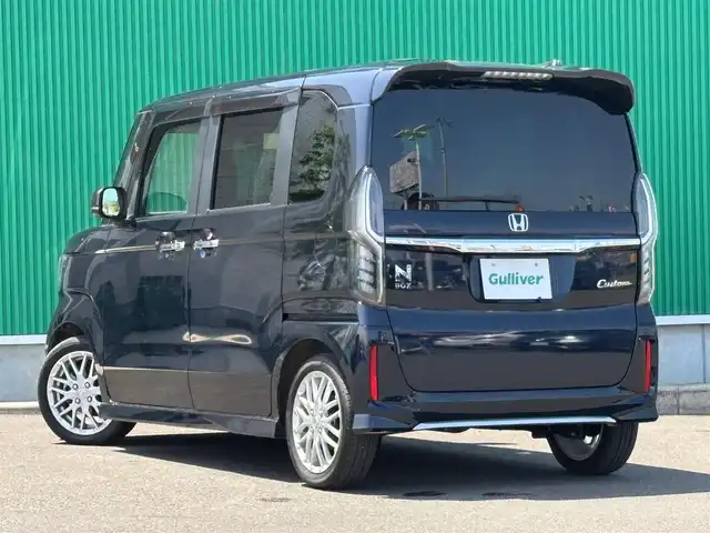ホンダ Ｎ ＢＯＸ カスタム L ターボ 宮城県 2021(令3)年 0.9万km ミッドナイトブルービームM ホンダセンシング/・衝突軽減ブレーキ/・誤発進抑制機能/・後方誤発進抑制機能/・歩行者事故低減ステアリング/・先行車発進お知らせ機能/・オートハイビーム/・標識認識機能/・路外逸脱抑制機能/・アダプティブクルーズコントロール/・車線維持支援システム/パーキングセンサー/純正8インチナビ（VXU-217NBi）/・CD/DVD/・Bluetooth/・フルセグTV/バックカメラ/ビルトインETC/純正ドライブレコーダー（前後）/両側パワースライドドア/ハーフレザーシート/シートヒーター/革巻きステアリング/パドルシフト/ステアリングスイッチ/LEDヘッドライト/フォグランプ/オートライト/スマートキー＆プッシュスタート/電動格納ミラー/純正15インチAW/フロアマット/ドアバイザー/W/サイド/カーテンエアバッグ