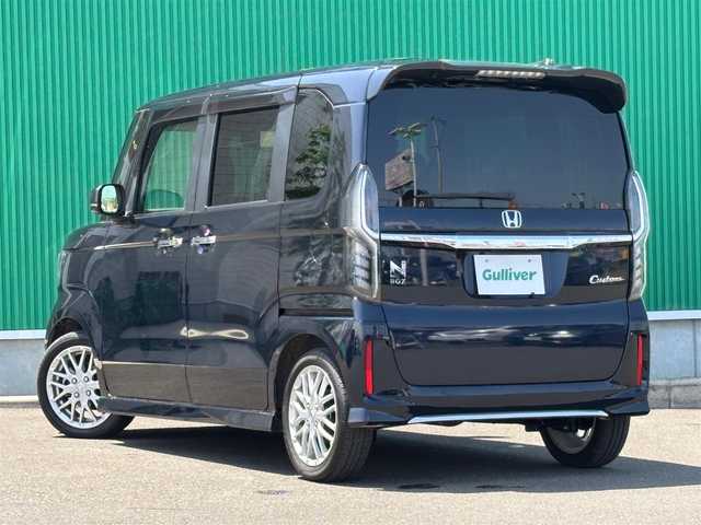 ホンダ Ｎ ＢＯＸ カスタム L ターボ 宮城県 2021(令3)年 0.9万km ミッドナイトブルービームM ホンダセンシング/・衝突軽減ブレーキ/・誤発進抑制機能/・後方誤発進抑制機能/・歩行者事故低減ステアリング/・先行車発進お知らせ機能/・オートハイビーム/・標識認識機能/・路外逸脱抑制機能/・アダプティブクルーズコントロール/・車線維持支援システム/パーキングセンサー/純正8インチナビ（VXU-217NBi）/・CD/DVD/・Bluetooth/・フルセグTV/バックカメラ/ビルトインETC/純正ドライブレコーダー（前後）/両側パワースライドドア/ハーフレザーシート/シートヒーター/革巻きステアリング/パドルシフト/ステアリングスイッチ/LEDヘッドライト/フォグランプ/オートライト/スマートキー＆プッシュスタート/電動格納ミラー/純正15インチAW/フロアマット/ドアバイザー/W/サイド/カーテンエアバッグ