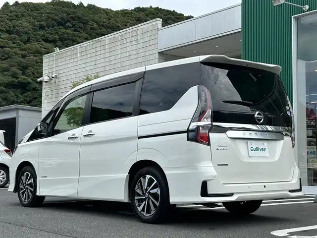 日産 セレナ ハイウェイスター V 愛媛県 2020(令2)年 4.7万km ブリリアントホワイトパール 純正フリップダウンモニター/純正10インチナビ/・Blutooth/・フルセグTV/・CD/DVD/全周囲カメラ/両側パワースライドドア/リアサンシェード/ドライブレコーダー/ＥＴＣ/社外フロアマット/純正アルミホイール/パ－キングアシスト/レーンアシスト/プロパイロット/エマージェンシーブレーキ/LEDヘッドライト/オートライト/ドアバイザー/ウィンカーミラー/防水シート