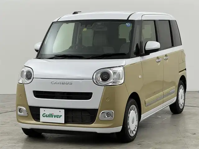 ダイハツ ムーヴ キャンバス ストライプス G 福岡県 2022(令4)年 1.2万km シャイニングホワイトパール/サンドベージュメタリック 純正ナビ／フルセグＴＶ　/バックカメラ　/ホッとカップホルダー　/前後ドライブレコーダー　/コーナーセンサー　/衝突被害軽減ブレーキ　/アイドリングストップ　/両側電動スライドドア　/シートヒーター　/プッシュスタート