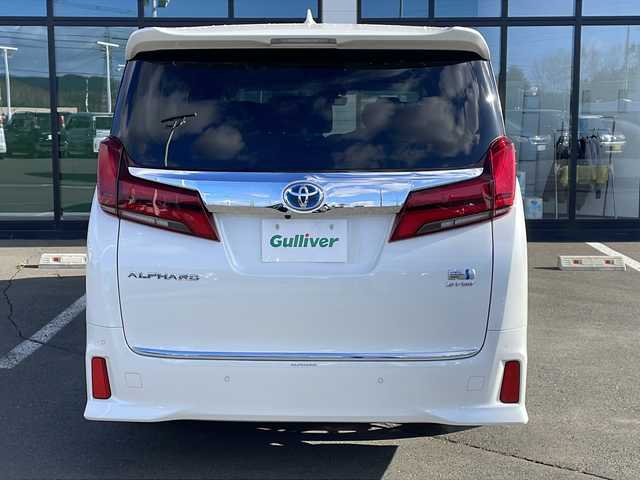 トヨタ アルファードハイブリット SR Cパッケージ 道東・釧路十勝 2018(平30)年 3.6万km ホワイトパールクリスタルシャイン ・4WD/・社外8インチSDナビ/（BT・フルセグ・CD・DVD・FM・AM）/・バックカメラ/・10.2インチフリップダウンモニター/・両側パワースライドドア/・レーダークルーズコントロール/・レーンキープアシスト/・コーナーセンサー/・横滑り防止/・パワーバックドア/・シートヒーター/エアーシート/・ステアリングヒーター/・前席パワーシート/・三眼LEDヘッドライト/・オートライト/・オートマチックハイビーム/・ステアリングスイッチ/・ビルトインETC/・AC100V（1500W）/・デジタルインナーミラー/・オットマン/・電格ウィンカーミラー/・スマートキー/・プッシュスタート