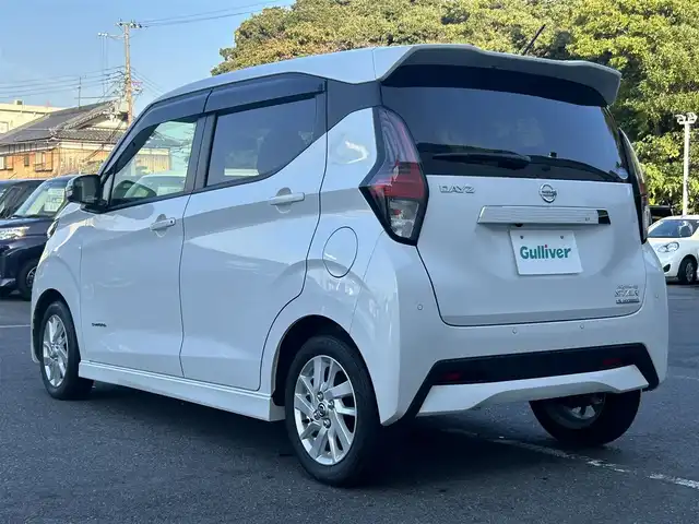 日産 デイズ ハイウェイスターX 大阪府 2021(令3)年 1.3万km ホワイトパール 9インチナビ　/フルセグ　/Bluetooth　/全方位カメラ　/ETC　/スマートキー　/前後コーナーセンサー　/衝突軽減ブレーキ　/LEDヘッドライト　/純正フロアーマット　/サイドバイザー