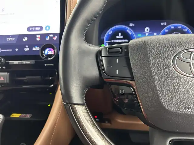 トヨタ ヴェルファイア ハイブリット エグゼクティブ ラウンジ 千葉県 2024(令6)年 1.9万km ブラック 禁煙車/純正14インチディスプレイ/　ナビ機能付き/BT/フルセグTV/純正14インチリアエンターテイメント/JBLプレミアムサウンドシステム/左右独立ムーンルーフ/パノラミックビューモニター/トヨタチームメイト/　・プリクラッシュセーフティ（PCS）/　・レーントレーシングアシスト（LTA）/　・レーンディパーチャーアラート（LDA）/　・レーダークルーズコントロール/　・アダプティブハイビームシステム（AHS）/オートマチックハイビーム（AHB）/　・ロードサインアシスト（RSA）/　・ドライバー異常時対応システム/　・プロアクティブドライビングアシスト（PDA）/　・発進遅れ告知機能（TMN）/　・緊急時操舵支援（アクティブ操舵機能付）/　・フロントクロストラフィックアラート（FCTA）/　・レーンチェンジアシスト（LCA）/ブラインドスポットモニター/レーダークルーズコントロール/コーナーセンサー/デジタルインナーミラー/前席・セカンドシートシートヒーター/エアシート/両側パワースライドドア/ETC2.0/パワーバックドア/AC100V/ヘッドアップディスプレイ