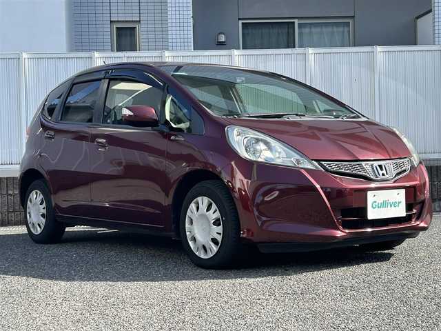 ホンダ フィット G 10thアニバーサリーⅡ 愛知県 2011(平23)年 9.2万km プレミアムディープロッソパール 社外メモリナビ/(FM/AM/CD/DVD/USB/iPod/AUX/ワンセグ)/バックカメラ/特別仕様車/ドライブレコーダー/HIDヘッドライト/電動格納ミラー/アイドリングストップ/ETC/純正フロアマット/リモコンキー/ステアリングリモコン/ABS/保証書
