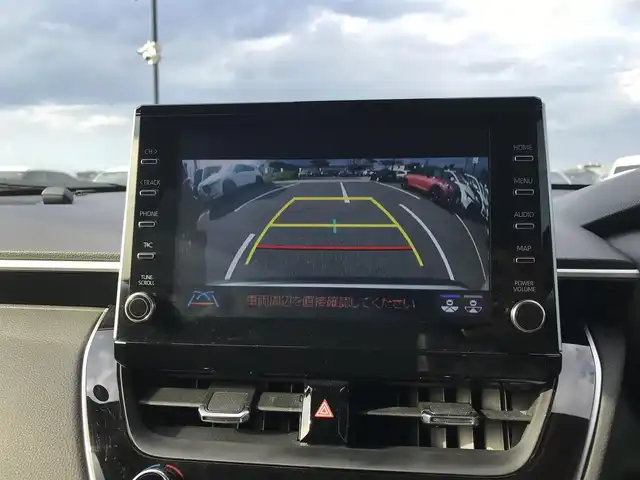 トヨタ カローラ クロス ハイブリッド Z 鳥取県 2022(令4)年 2.6万km プラチナホワイトパールマイカ 純正9インチナビ/フルセグ/CD/DVD/BT/バックカメラ・ETC2.0/前後ドライブレコーダー/トヨタセーフティセンス/ブラインドスポットモニター/レーンキープアシスト/レーダークルーズコントロール/ハーフレザーシート/運転席パワーシート/前席シートヒーター/パワーバックドア/LEDヘットライト/純正18インチアルミホイール/プッシュエンジンスタート/スペアキー
