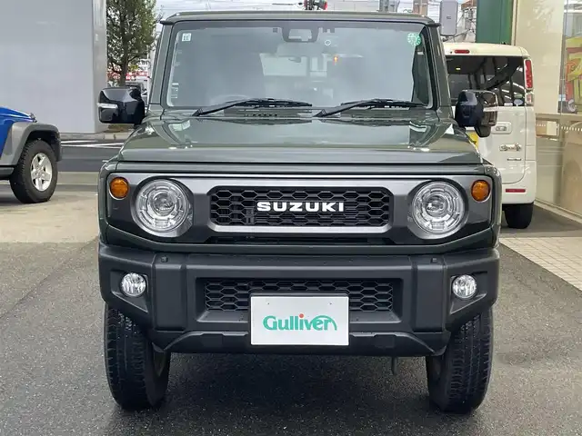 スズキ ジムニー XC 愛知県 2021(令3)年 4.2万km ジャングルグリーン KENWOODナビ〈MDV-709BT〉/・Bluetooth／地デジTV/USB/・SD/DVD/HDMI/Clazzio製レザー調シートカバー/前席シートヒーター/純正マッドフラップ/スズキセーフティサポート/・デュアルセンサーブレーキサポート/・誤発進抑制機能/・車線逸脱警報/・ふらつき警報/クルーズコントロール/ヒルディセントコントロール/アンテナ分離型ETC/KENWOODドライブレコーダー〈DRV-MR450〉/ヘッドライトウォッシャー
