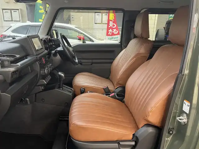 スズキ ジムニー XC 愛知県 2021(令3)年 4.2万km ジャングルグリーン KENWOODナビ〈MDV-709BT〉/・Bluetooth／地デジTV/USB/・SD/DVD/HDMI/Clazzio製レザー調シートカバー/前席シートヒーター/純正マッドフラップ/スズキセーフティサポート/・デュアルセンサーブレーキサポート/・誤発進抑制機能/・車線逸脱警報/・ふらつき警報/クルーズコントロール/ヒルディセントコントロール/アンテナ分離型ETC/KENWOODドライブレコーダー〈DRV-MR450〉/ヘッドライトウォッシャー