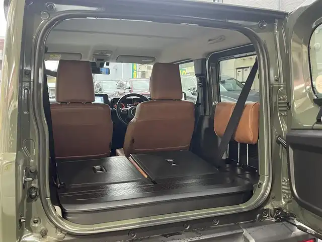 スズキ ジムニー XC 愛知県 2021(令3)年 4.2万km ジャングルグリーン KENWOODナビ〈MDV-709BT〉/・Bluetooth／地デジTV/USB/・SD/DVD/HDMI/Clazzio製レザー調シートカバー/前席シートヒーター/純正マッドフラップ/スズキセーフティサポート/・デュアルセンサーブレーキサポート/・誤発進抑制機能/・車線逸脱警報/・ふらつき警報/クルーズコントロール/ヒルディセントコントロール/アンテナ分離型ETC/KENWOODドライブレコーダー〈DRV-MR450〉/ヘッドライトウォッシャー
