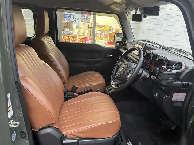 スズキ ジムニー XC 愛知県 2021(令3)年 4.2万km ジャングルグリーン KENWOODナビ〈MDV-709BT〉/・Bluetooth／地デジTV/USB/・SD/DVD/HDMI/Clazzio製レザー調シートカバー/前席シートヒーター/純正マッドフラップ/スズキセーフティサポート/・デュアルセンサーブレーキサポート/・誤発進抑制機能/・車線逸脱警報/・ふらつき警報/クルーズコントロール/ヒルディセントコントロール/アンテナ分離型ETC/KENWOODドライブレコーダー〈DRV-MR450〉/ヘッドライトウォッシャー