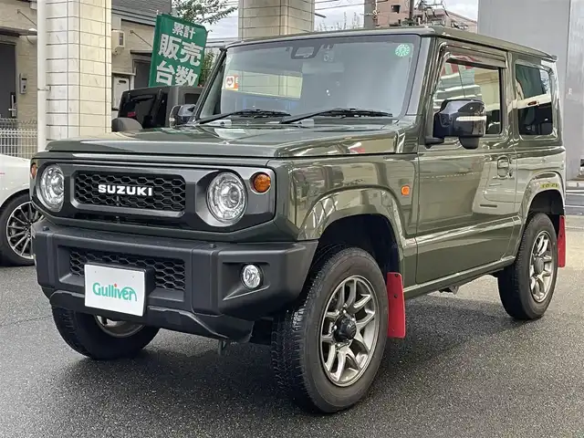 スズキ ジムニー XC 愛知県 2021(令3)年 4.2万km ジャングルグリーン KENWOODナビ〈MDV-709BT〉/・Bluetooth／地デジTV/USB/・SD/DVD/HDMI/Clazzio製レザー調シートカバー/前席シートヒーター/純正マッドフラップ/スズキセーフティサポート/・デュアルセンサーブレーキサポート/・誤発進抑制機能/・車線逸脱警報/・ふらつき警報/クルーズコントロール/ヒルディセントコントロール/アンテナ分離型ETC/KENWOODドライブレコーダー〈DRV-MR450〉/ヘッドライトウォッシャー