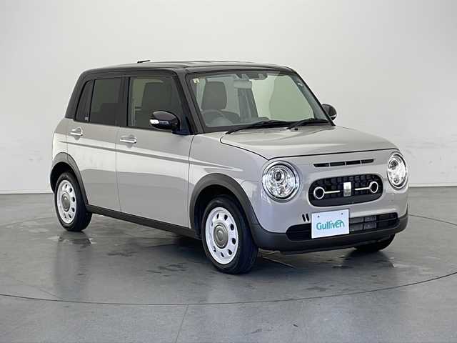 スズキ ラパン X 長野県 2022(令4)年 1.5万km フォーンベージュメタリック/アーバンブラウン 2トーン 4WD/純正ディスプレイオーディオ/衝突被害軽減システム/コーナーセンサー/バックカメラ/アイドリングストップ/Bluetooth/USB/シートヒーター（運転席、助手席）/オートライト/LEDヘッドライト/ステアリングスイッチ/純正フロアマット/純正アルミホイール/電動格納ミラー