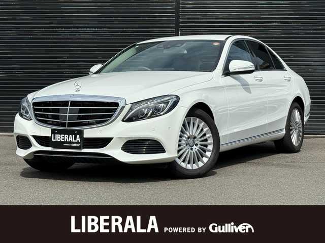 メルセデス・ベンツ Ｃ２００ エクスクルーシブラインリミテッド 静岡県 2015(平27)年 4万km ポーラホワイト ハーフレザーシート/BSM/純正ナビ/(CD/DVD/Bluetooth/フルセグ)/衝突被害軽減システム/バックカメラ/アダプティブクルーズコントロール/レーンキープアシスト/パーキングアシスト/メモリー付パワーシート/シートヒーター/キーレスゴー/ETC/フロアマット/純正17インチアルミホイール/保証書/取説/スペアキー