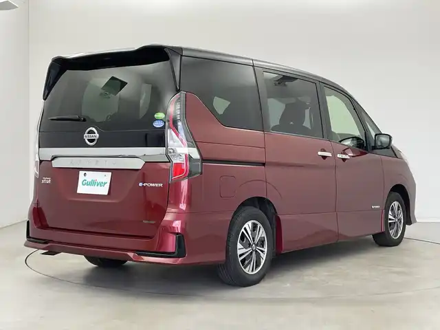 日産 セレナ e－パワー ハイウェイスター V 新潟県 2020(令2)年 6.7万km マルーンレッド 2トーン 純正メモリナビ/　フルセグTV/Bluetooth/CD/DVD/Blu-ray/セーフティパックB/・SRSカーテンエアバッグシステム&サイドエアバッグシステム/・踏み間違い衝突防止アシスト/・インテリジェントパーキングアシスト(駐車支援システム)/・標識検知機能/(進入禁止標識、最高速度標識、一時停止標識)/・インテリジェントアラウンドビューモニター/・インテリジェントDA(ふらつき警報)/・フロント&バックソナー/・インテリジェントルームミラー/・電動パーキングブレーキ/・オートブレーキホールド/・プロパイロット/・インテリジェントLI(車線逸脱防止支援システム)/・ヒーター付ドアミラー/・ステアリングスイッチ/衝突被害軽減ブレーキ/レーダークルーズコントロール/両側パワースライドドア/ドライブレコーダー【DJ4-D】/シートヒーター/ステアリングヒーター/ビルトインETC/前後コーナーセンサー/横滑り防止装置/オートライト