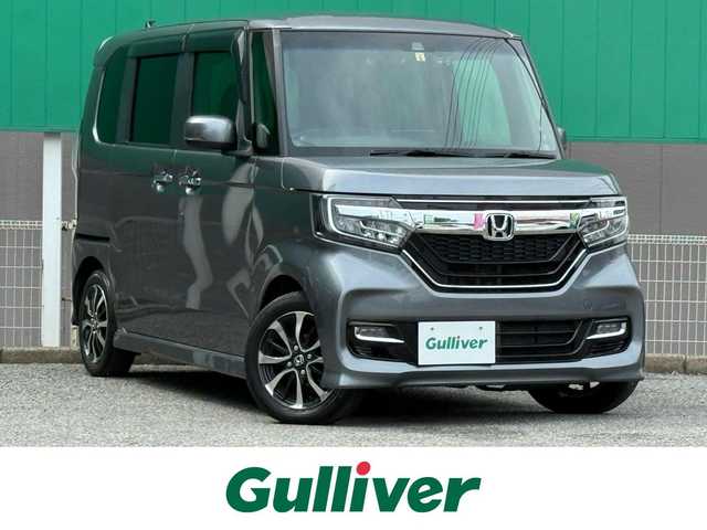 ホンダ Ｎ ＢＯＸ カスタム G L ホンダセンシング 千葉県 2019(令1)年 3.5万km シャイニンググレーM 社外SDナビ/　(CD/DVD/SD/Bluetooth)/フルセグTV/バックカメラ/前後ドライブレコーダー (ZDR-015)/ビルトインETC/アダプティブクルーズコントロール/ホンダセンシング/　●衝突軽減ブレーキ/　●誤発進抑制機能/　●後方誤発進抑制機能/　●歩行者事故低減ステアリング/　●路外逸脱抑制機能/　●LKAS〈車線維持支援システム〉/　●先行車発進お知らせ機能/　●標識認識機能/左側パワースライドドア/リア席サイドサンシェード/オートライト/オートハイビーム/LEDヘッドライト/LEDフォグランプ/ウィンカー付き電動格納ミラー/ドアバイザー/ダブル＆サイド＆カーテンエアバッグ/取扱説明書/ナビ取扱説明書