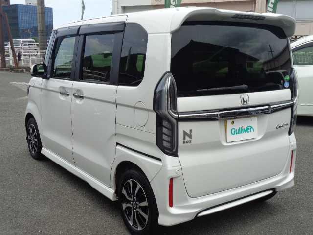 ホンダ Ｎ ＢＯＸ カスタム G L ホンダセンシング 鹿児島県 2019(令1)年 1.1万km プラチナホワイトパール ワンオーナー/ホンダセンシング/純正エントリーインターナビゲーション（VXM-194Ci)/Ｂluetooth.CD.SD再生.USB通信.USB充電2口/ナビ装着パッケージ　8スピーカー/ステアリングリモコン/バックカメラ/クルーズコントロール/ビルトインETC（新セキュリティ）/両側パワースライドドア/社外前後ドラレコ（ＷＤＲ）/オートライト/オートリトラクタミラー/降車時オートロック/リモコンキー　Ｘ2/取扱説明書　ナビ取説　ETC取説　保証書有り