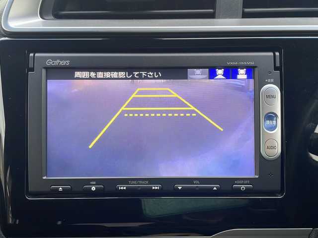 ホンダ フィット ハイブリット Sパッケージ 神奈川県 2014(平26)年 2.7万km アラバスターシルバーメタリック ワンオーナー/純正ディーラーナビ/(CD/DVD/SD/USB/BT/ワンセグTV)/バックカメラ/クルーズコントロール/パドルシフト/前車両発進アラート/横滑り防止装置/アイドリングストップ/ETC/オートライト/フォグランプ/純正フロアマット/ISOFIX/スペアキー×1/保証書/取扱説明書