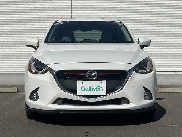 マツダ デミオ XD ツーリング Lパッケージ 秋田県 2015(平27)年 8.3万km スノーフレイクホワイトパールマイカ ターボ/４WD/衝突軽減システム/LEDヘッドライト/純正SDナビ（DVD/CD再生可能）/フルセグ/バックカメラ/マツダ純正１６インチアルミ（夏タイヤ装着）/スマートキー/アイドリングストップ/プッシュスタート/マツダ・レーダークルーズコントロール追従走行無/オートマチックハイビーム/レーンキープアシスト/MTモード付AT/ステアリングスイッチ/ビルトインETC/ブラインドスポットモニター/パドルシフト/純正エンジンスターター/純正フロアマット/社外ドアバイザー/オートライト/オートエアコン/パワーステアリング/パワーウィンドウ/横滑り防止/盗難防止装置/寒冷地仕様/電動格納ウィンカーミラー/キーレスエントリー/保証書/取扱説明書/記録簿/スペアキー1本有