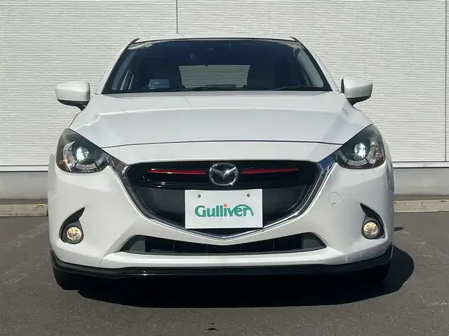 マツダ デミオ XD ツーリング Lパッケージ 秋田県 2015(平27)年 8.3万km スノーフレイクホワイトパールマイカ ターボ/４WD/衝突軽減システム/LEDヘッドライト/純正SDナビ（DVD/CD再生可能）/フルセグ/バックカメラ/マツダ純正１６インチアルミ（夏タイヤ装着）/スマートキー/アイドリングストップ/プッシュスタート/マツダ・レーダークルーズコントロール追従走行無/オートマチックハイビーム/レーンキープアシスト/MTモード付AT/ステアリングスイッチ/ビルトインETC/ブラインドスポットモニター/パドルシフト/純正エンジンスターター/純正フロアマット/社外ドアバイザー/オートライト/オートエアコン/パワーステアリング/パワーウィンドウ/横滑り防止/盗難防止装置/寒冷地仕様/電動格納ウィンカーミラー/キーレスエントリー/保証書/取扱説明書/記録簿/スペアキー1本有