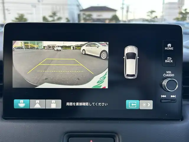 ホンダ ヴェゼル ハイブリッド e:HEV X 岡山県 2022(令4)年 7.7万km メテオロイドグレーメタリック 登録時走行距離76750km/純正9インチナビ/(RADIO/TV/USB/Bluetooth)/ホンダセンシング/・衝突軽減ブレーキ(CMBS)/・アダプティブクルーズコントロール(ACC)/・車線維持支援システム(LKAS)/・オートハイビーム/・先行車発進お知らせ機能/バックカメラ/ビルトインETC2.0/ヒルディセントコントロール/パーキングセンサー/電子制御パーキングブレーキ/オートマチックハイビーム/ドライブレコーダー/ヘッドライトレベライザー/ステアリングスイッチ/純正16インチアルミホイール/プッシュスタート/スマートキー