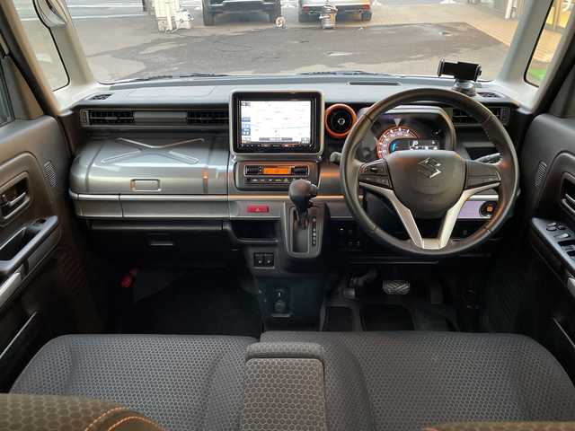 スズキ スペーシア ギア HYBRID XZ 埼玉県 2019(令1)年 4.7万km ピュアホワイトP 登録時46897km/ワンオーナー/純正８インチナビ/　・CD/DVD/BT/フルセグTV/アランドビューモニター/両側パワースライドドア/衝突軽減システム/レーンアシスト/コーナーセンサー/ルーフレール/キャリアー/ヘッドアップディスプレイ/LEDヘッドライト/フォグランプ/革巻きハンドル/ステアリングスイッチ/サイドエアロ/アイドリングストップ/ビルトインETC/ドライブレコーダー/プッシュスタート/スマートキー×2/前席シートヒーター/横滑り防止装置/ウィンカーミラー/シートリフター/純正フロアマット/純正ドアバイザー/取扱説明書/保証書