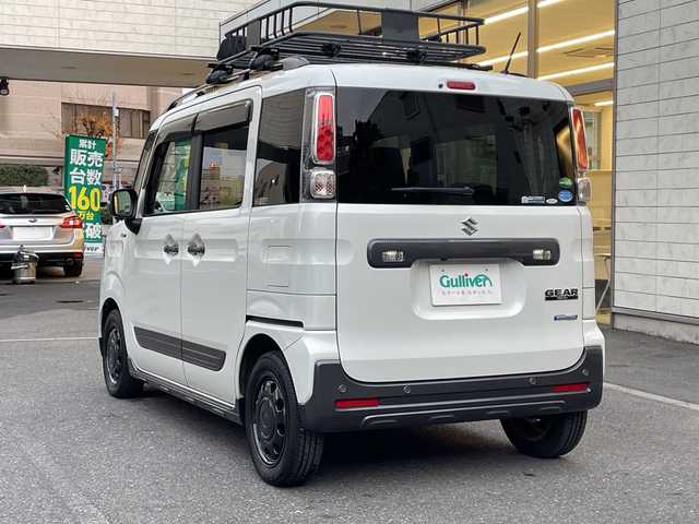 スズキ スペーシア ギア HYBRID XZ 埼玉県 2019(令1)年 4.7万km ピュアホワイトP 登録時46897km/ワンオーナー/純正８インチナビ/　・CD/DVD/BT/フルセグTV/アランドビューモニター/両側パワースライドドア/衝突軽減システム/レーンアシスト/コーナーセンサー/ルーフレール/キャリアー/ヘッドアップディスプレイ/LEDヘッドライト/フォグランプ/革巻きハンドル/ステアリングスイッチ/サイドエアロ/アイドリングストップ/ビルトインETC/ドライブレコーダー/プッシュスタート/スマートキー×2/前席シートヒーター/横滑り防止装置/ウィンカーミラー/シートリフター/純正フロアマット/純正ドアバイザー/取扱説明書/保証書
