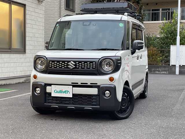 スズキ スペーシア ギア HYBRID XZ 埼玉県 2019(令1)年 4.7万km ピュアホワイトP 登録時46897km/ワンオーナー/純正８インチナビ/　・CD/DVD/BT/フルセグTV/アランドビューモニター/両側パワースライドドア/衝突軽減システム/レーンアシスト/コーナーセンサー/ルーフレール/キャリアー/ヘッドアップディスプレイ/LEDヘッドライト/フォグランプ/革巻きハンドル/ステアリングスイッチ/サイドエアロ/アイドリングストップ/ビルトインETC/ドライブレコーダー/プッシュスタート/スマートキー×2/前席シートヒーター/横滑り防止装置/ウィンカーミラー/シートリフター/純正フロアマット/純正ドアバイザー/取扱説明書/保証書