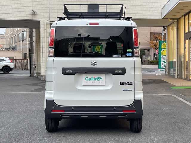 スズキ スペーシア ギア HYBRID XZ 埼玉県 2019(令1)年 4.7万km ピュアホワイトP 登録時46897km/ワンオーナー/純正８インチナビ/　・CD/DVD/BT/フルセグTV/アランドビューモニター/両側パワースライドドア/衝突軽減システム/レーンアシスト/コーナーセンサー/ルーフレール/キャリアー/ヘッドアップディスプレイ/LEDヘッドライト/フォグランプ/革巻きハンドル/ステアリングスイッチ/サイドエアロ/アイドリングストップ/ビルトインETC/ドライブレコーダー/プッシュスタート/スマートキー×2/前席シートヒーター/横滑り防止装置/ウィンカーミラー/シートリフター/純正フロアマット/純正ドアバイザー/取扱説明書/保証書