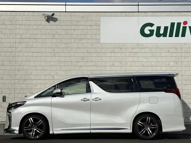 トヨタ アルファード S タイプゴールドⅡ 岩手県 2022(令4)年 2.1万km ホワイトパールクリスタルシャイン 禁煙車/4WD/モデリスタフルエアロ/純正フリップダウンモニター/ディスプレイオーディオナビ/→フルセグTV/Bluetooth/FM/AM/バックカメラ/両側パワースライドドア/パワーバックドア/ローダウン（TEIN）/社外20インチAW/ハーフレザー/ステアリングスイッチ/トヨタセーフティセンス/追従型クルーズコントロール/ブラインドスポットモニター/レーンキープアシスト/衝突軽減システム/前後コーナーセンサー/横滑り防止装置/電子パーキング/オートブレーキホールド/オートライト/オートハイビーム/LEDヘッドライト/LEDフォグライト/〇プッシュスタート/〇電動格納ミラー/〇ウィンカーミラー/〇ドアバイザー/〇フロアマット/〇シガーソケット/〇USBポート/前後ドライブレコーダー/ビルトインETC/冬タイヤ社外アルミホイール車載