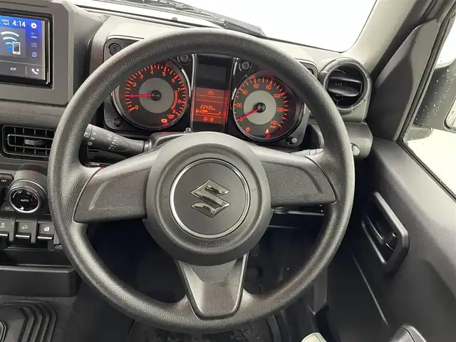 スズキ ジムニー XL 熊本県 2021(令3)年 2.3万km ミディアムグレー ワンオーナー　/禁煙車　/5速MT/ディスプレイオーディオ/バックカメラ　/社外全周囲ドラレコ　/ＥＴＣ２．０　/社外マフラー/前席シートヒーター　/ダウンヒルアシスト　/横滑り防止　/電動格納ミラー/スマートキー/プッシュスタート/スペアキー1本/保証書/取扱説明書