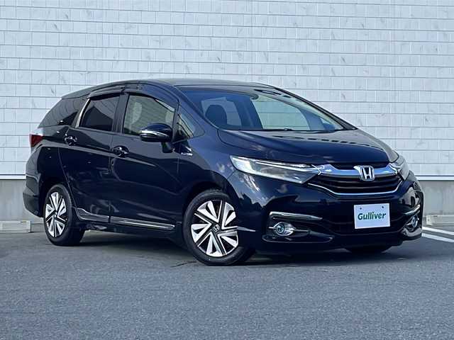 ホンダ シャトル ハイブリッド X スタイルエディション 山形県 2016(平28)年 7.8万km ミッドナイトブルービームM 禁煙車/合皮/ファブリックコンビシート/シティブレーキアシスト/クルーズコントロール/純正ナビ(CD.DVD.BT)/バックカメラ/フルセグ/ビルトインETC/横滑り防止/ECON/ウィンカーミラー/プッシュスタート/スマートキーｘ２