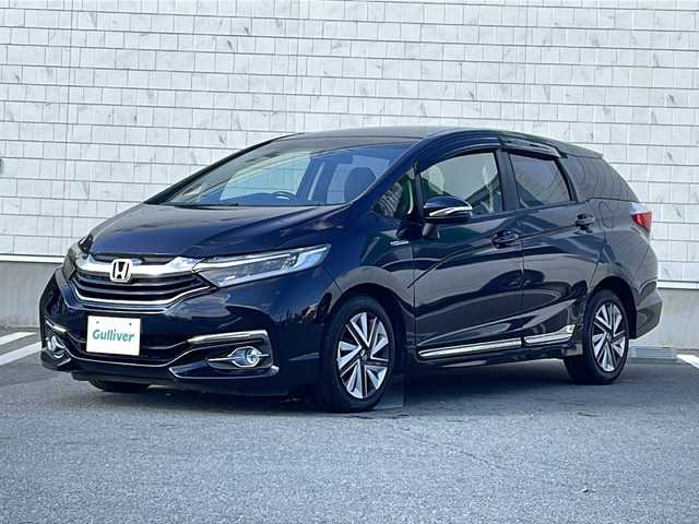 ホンダ シャトル ハイブリッド X スタイルエディション 山形県 2016(平28)年 7.8万km ミッドナイトブルービームM 禁煙車/合皮/ファブリックコンビシート/シティブレーキアシスト/クルーズコントロール/純正ナビ(CD.DVD.BT)/バックカメラ/フルセグ/ビルトインETC/横滑り防止/ECON/ウィンカーミラー/プッシュスタート/スマートキーｘ２