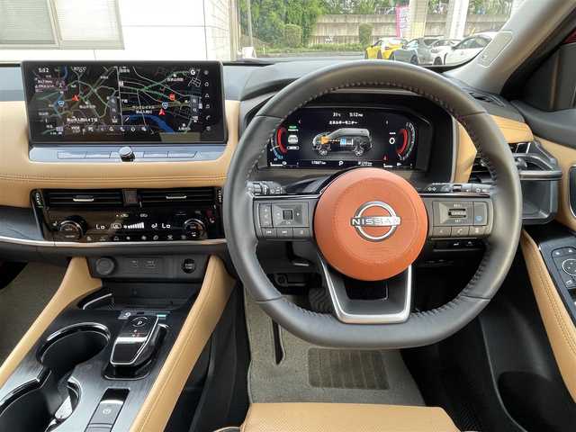 日産 エクストレイル G e－4ORCE 埼玉県 2024(令6)年 1.8万km 赤 ワンオーナー/NISMOエアロパーツ/キャメルレザー/パノラマサンルーフ/プロパイロット/パワーバックドア/パーキングアシスト/純正19インチアルミ/サイドステップ/全席シートヒーター/デジタルルームミラー/純正ナビTV/アラウンドビューモニター/ダウンヒルアシスト/LEDヘッドライト/FRコーナーセンサー/ハンドル支援/ETC/新車保証書/取扱説明書