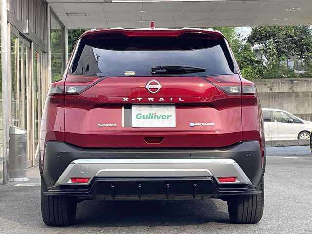 日産 エクストレイル G e－4ORCE 埼玉県 2024(令6)年 1.8万km 赤 ワンオーナー/NISMOエアロパーツ/キャメルレザー/パノラマサンルーフ/プロパイロット/パワーバックドア/パーキングアシスト/純正19インチアルミ/サイドステップ/全席シートヒーター/デジタルルームミラー/純正ナビTV/アラウンドビューモニター/ダウンヒルアシスト/LEDヘッドライト/FRコーナーセンサー/ハンドル支援/ETC/新車保証書/取扱説明書