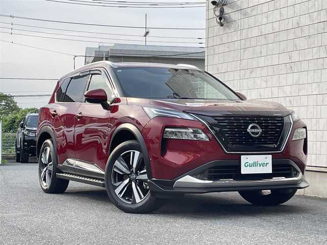 日産 エクストレイル G e－4ORCE 埼玉県 2024(令6)年 1.8万km 赤 ワンオーナー/NISMOエアロパーツ/キャメルレザー/パノラマサンルーフ/プロパイロット/パワーバックドア/パーキングアシスト/純正19インチアルミ/サイドステップ/全席シートヒーター/デジタルルームミラー/純正ナビTV/アラウンドビューモニター/ダウンヒルアシスト/LEDヘッドライト/FRコーナーセンサー/ハンドル支援/ETC/新車保証書/取扱説明書