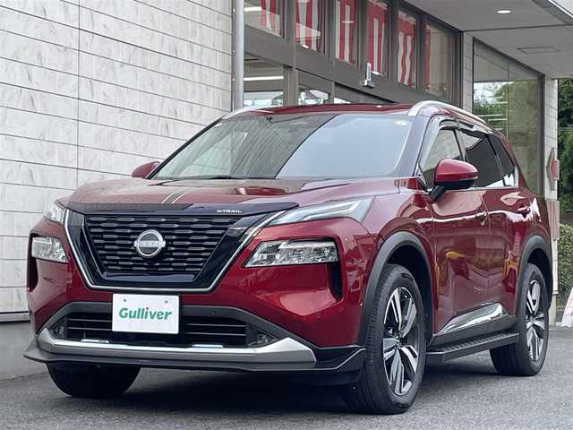 日産 エクストレイル G e－4ORCE 埼玉県 2024(令6)年 1.8万km 赤 ワンオーナー/NISMOエアロパーツ/キャメルレザー/パノラマサンルーフ/プロパイロット/パワーバックドア/パーキングアシスト/純正19インチアルミ/サイドステップ/全席シートヒーター/デジタルルームミラー/純正ナビTV/アラウンドビューモニター/ダウンヒルアシスト/LEDヘッドライト/FRコーナーセンサー/ハンドル支援/ETC/新車保証書/取扱説明書